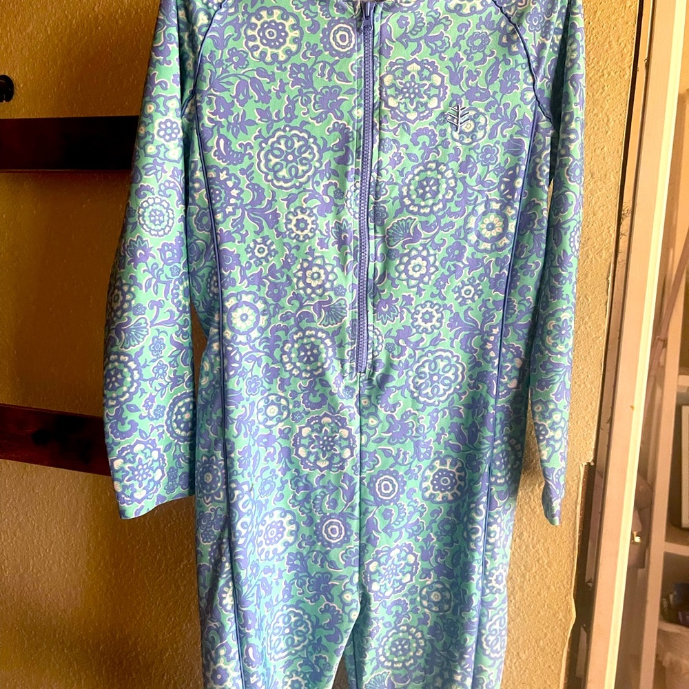 Coolibar one piece swim suit. Long sleeve and pants with zipper.